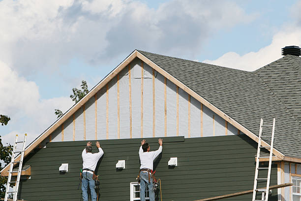 Professional Siding Contractor technician working in Hudson, CO